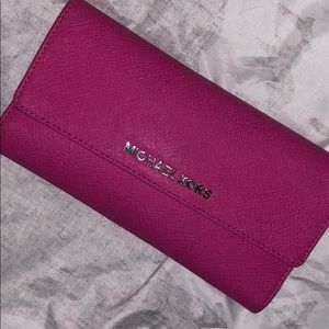 Pink mk wallet.